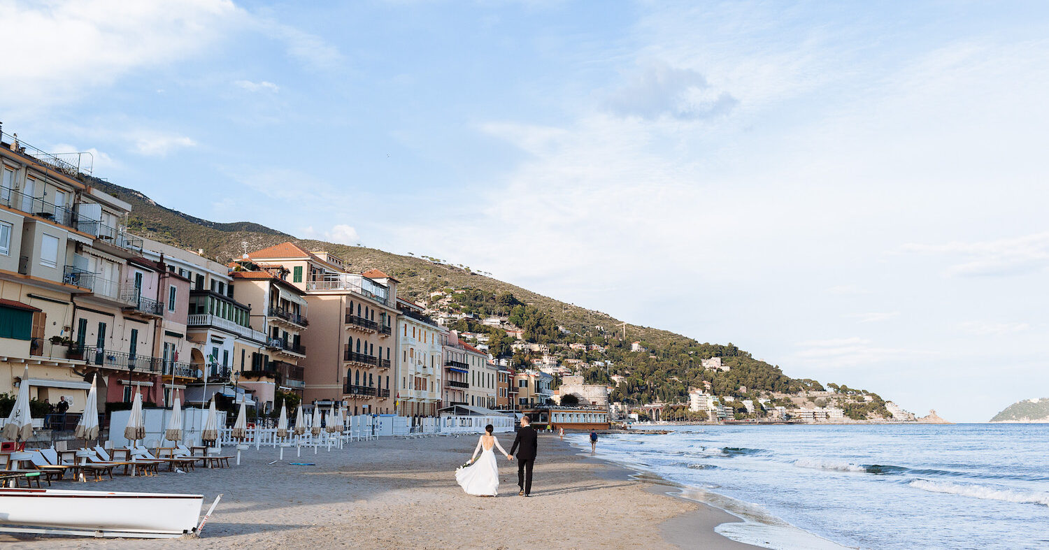 Ligurian Riviera spouses on Alassio's beach