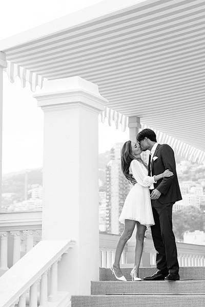 Black & White picture of Bride and groom kissing during the wedding reception at Villa La Vigie in Monte-Carlo