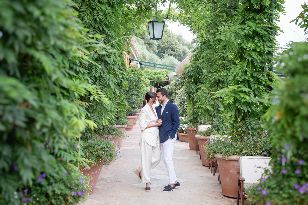 Couple walking through the garden at Hotel Splendido in Portofino