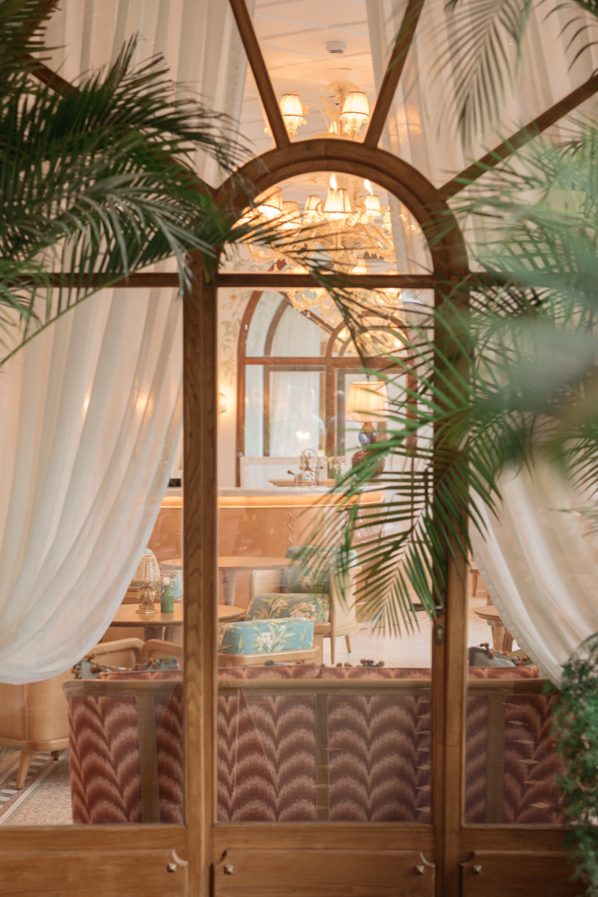 Interior view of Hotel Splendido in Portofino with elegant curtains and light