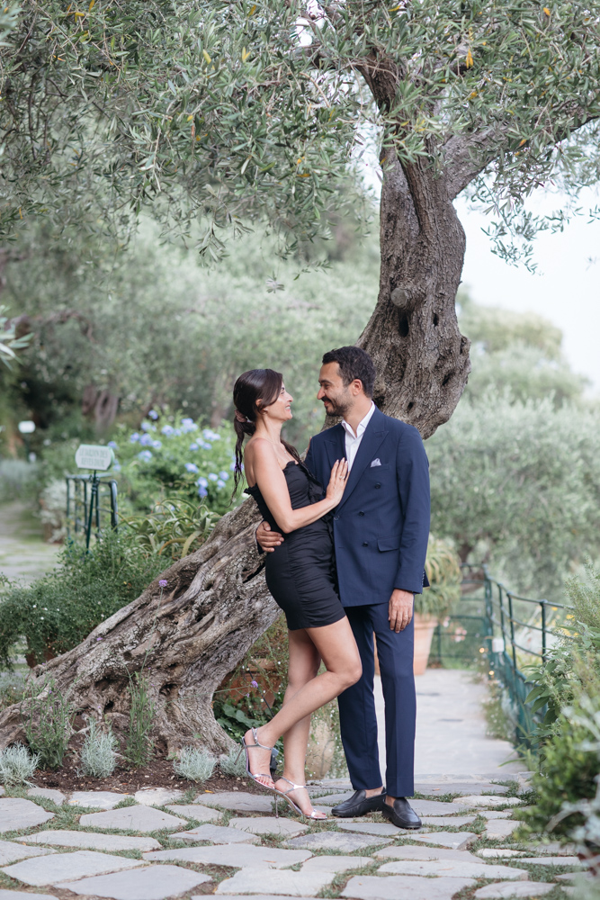 Couple embracing by a olive tree in Portofino during a portrait session